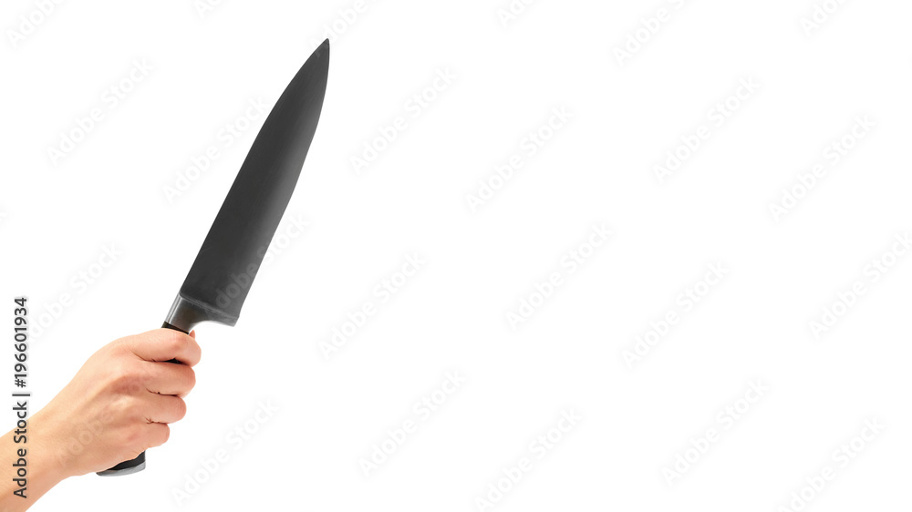 female hand holding a huge sharp knife. Isolated on white background. copy space, template. female hand holding a huge sharp knife. Isolated on white background. copy space, template.