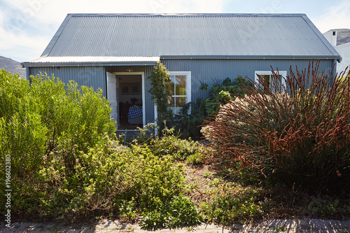 Lush gardens with a small guesthouse in the country
