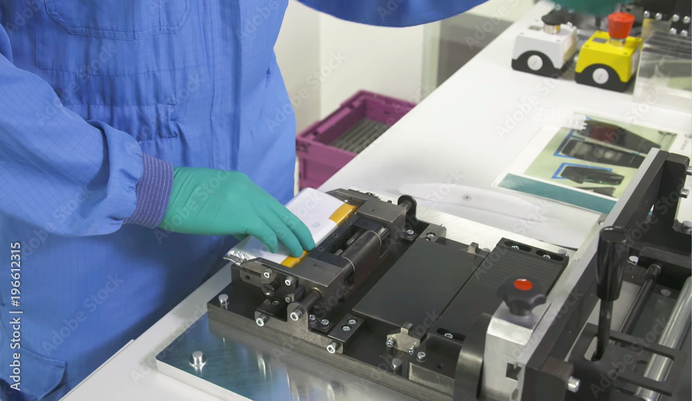 Abstract, blurry, bokeh background, image for the background.The operator on the production of lithium-ion battery Abstract, blurry, bokeh background, image for the background.The operator on the production of lithium-ion battery