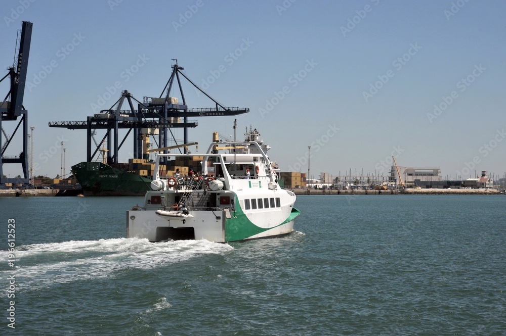 In the harbor of the seaport of Cadiz on the shore of the Cadiz Gulf of the Atlantic Ocean.