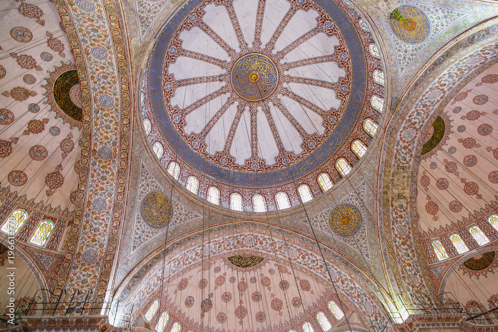 low angle view of arches and ceiling with mosaic in suleymaniye mosque in Istanbul, Turkey
