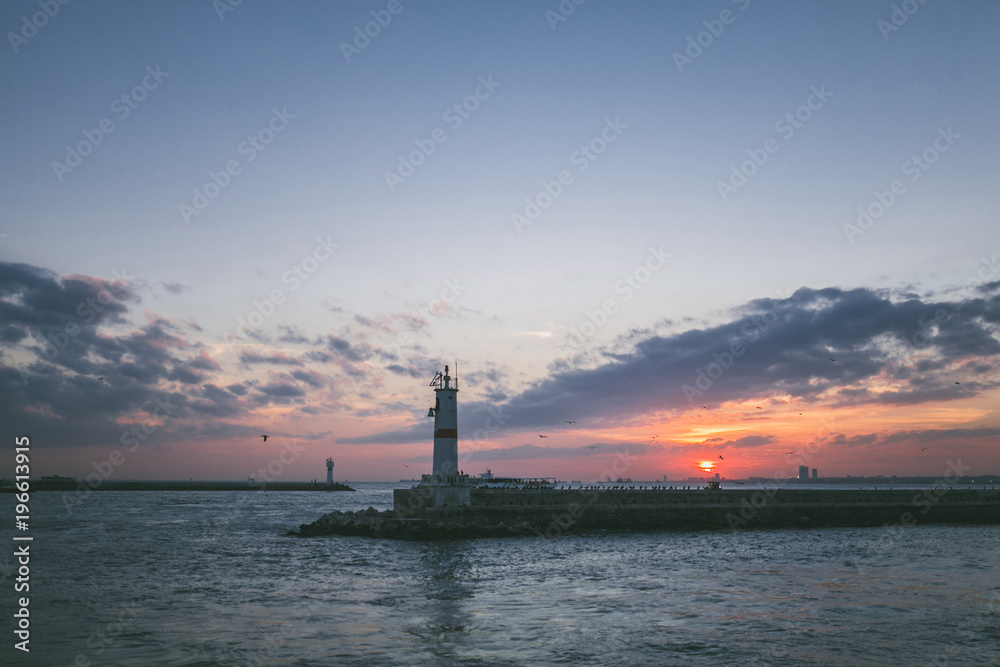 lighthouse in sea during sunset in Istanbul, Turkey