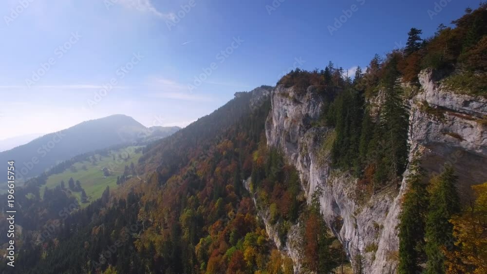 French Jura Mountain cinematic aerial shot. Beautiful drone shot a a lovely autumn day - rocky mountain with mist French Jura Mountain cinematic aerial shot. Beautiful drone shot a a lovely autumn day - rocky mountain with mist