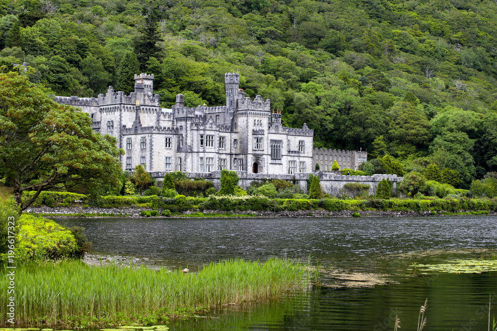 Old castle in the bank of river in the Ireland Old castle in the bank of river in the Ireland