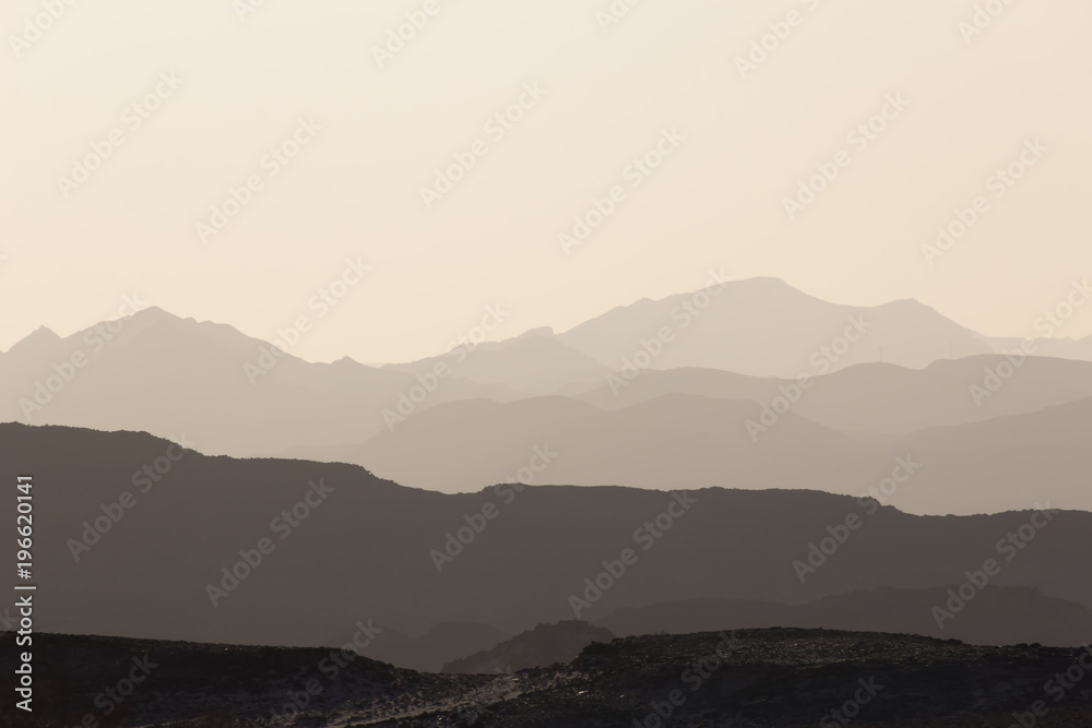 Obraz premium mountain silhouette in the Negev desert in Israel at sunset sunrise