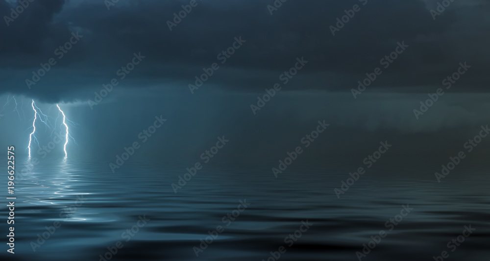 lightning bolts reflection over the sea. taken during a thunderstorm over the ocean with clouds in the background lightning bolts reflection over the sea. taken during a thunderstorm over the ocean with clouds in the background