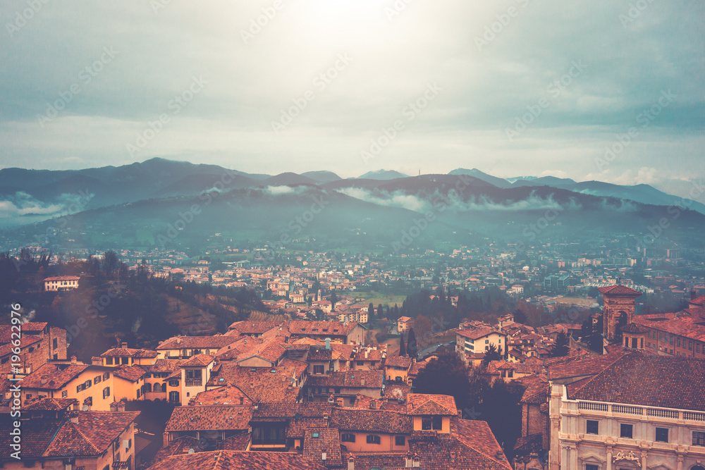 beautiful panoramic overview about bergamo with mountain skyline in the background