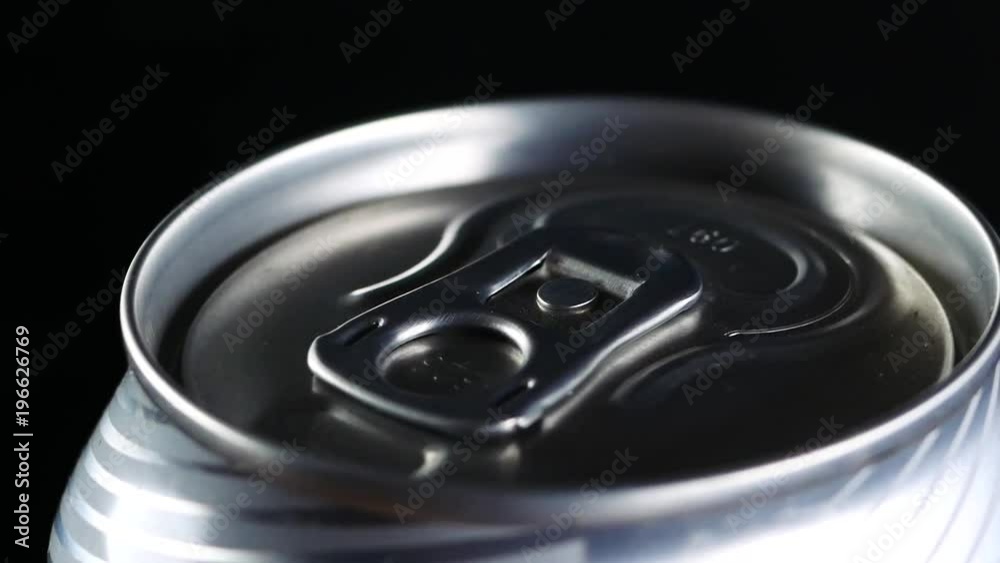 A cold drink rotates against a black background A cold drink rotates against a black background