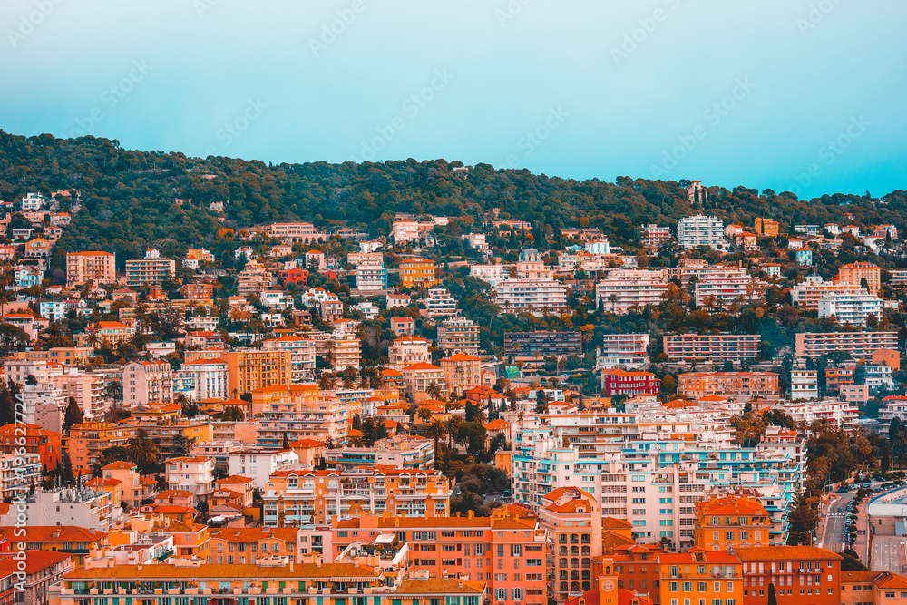 red colored houses on a big mountain at nice, france