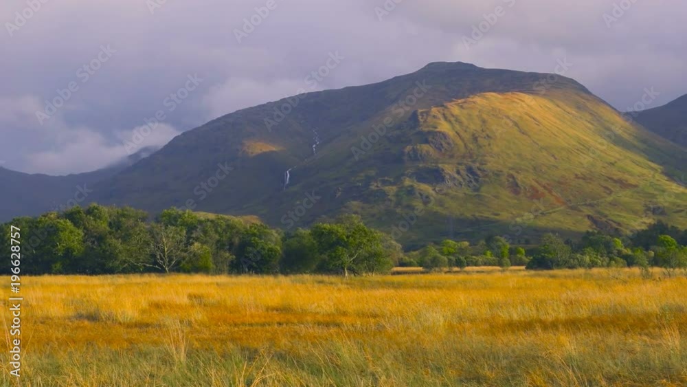 Rainbow after the Rain in a Valley of the Scottish Highlands Rainbow after the Rain in a Valley of the Scottish Highlands