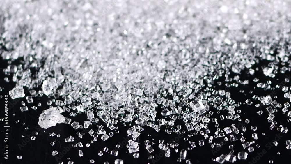Sugar on black background Sugar on black background