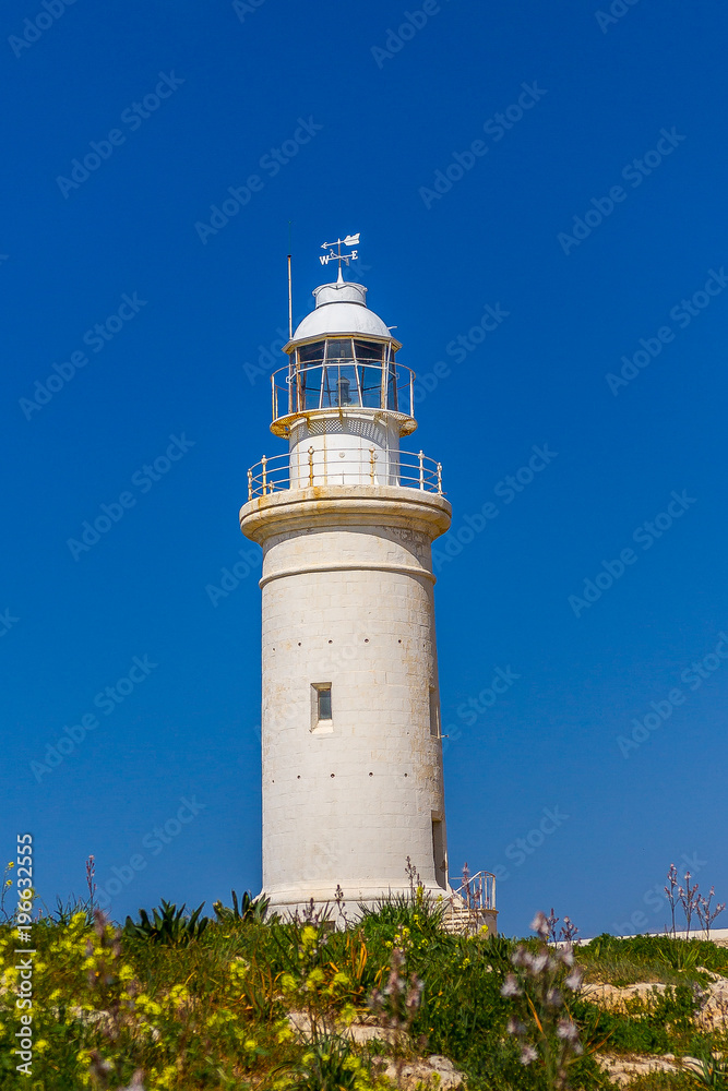 Lighthouse near the ancient Odeon Amphitheatre. Paphos, Cyprus Lighthouse near the ancient Odeon Amphitheatre. Paphos, Cyprus