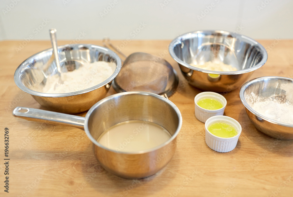 bowls with flour and egg whites at bakery kitchen bowls with flour and egg whites at bakery kitchen