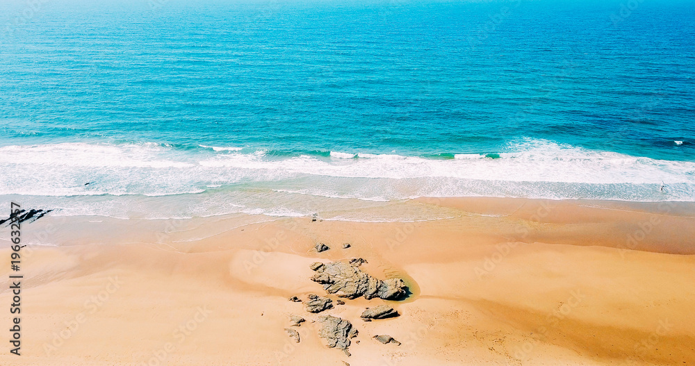 Fototapeta premium Aerial Panoramic Drone View Of Blue Ocean Waves And Beautiful Sandy Beach in Portugal