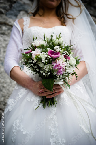 bouquet of the bride in her hands