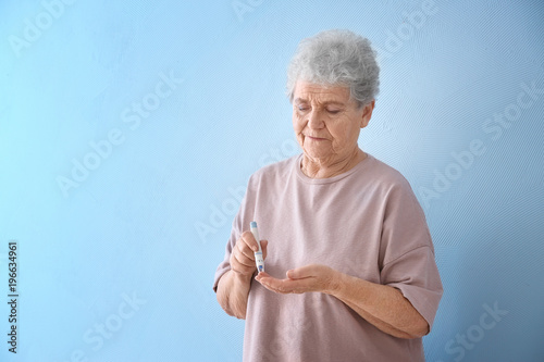 Elderly woman with diabetes...