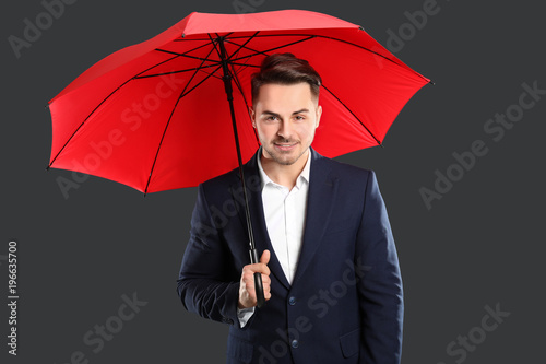 Young man in elegant suit w...