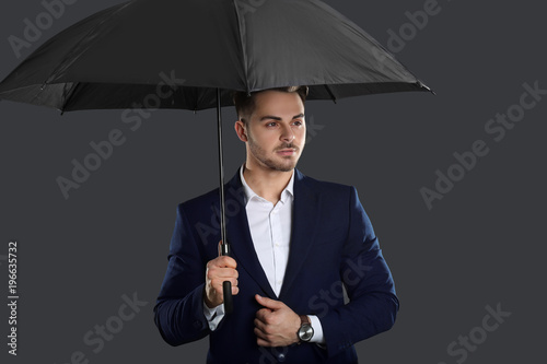 Young man in elegant suit w...