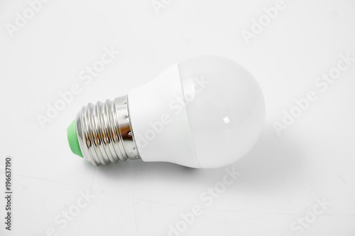 LED lamp with big cap on white background.