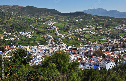 View of Chefchaouen with winding paths into the valley. © Karel