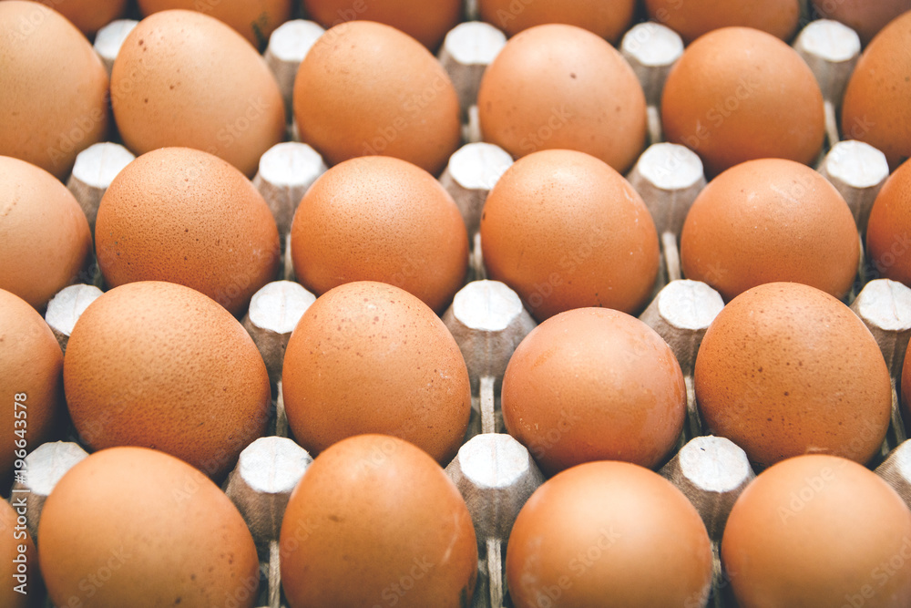 fresh Brown eggs on the grill as a background fresh Brown eggs on the grill as a background