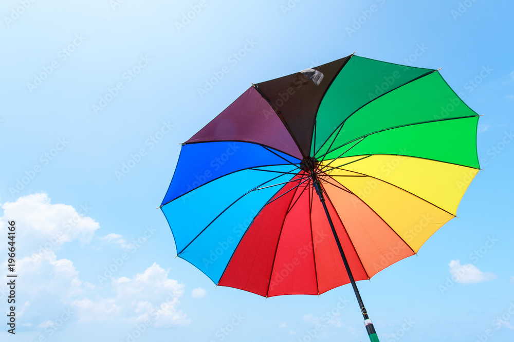 color full umbrella on blue sky