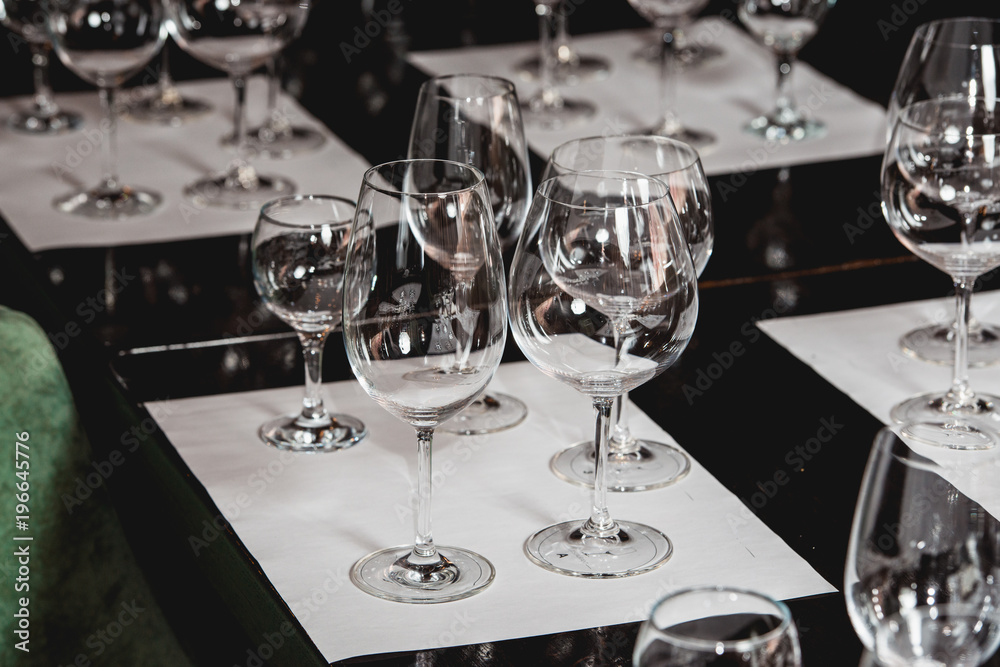 empty glasses of different shapes served for a wine tasting empty glasses of different shapes served for a wine tasting
