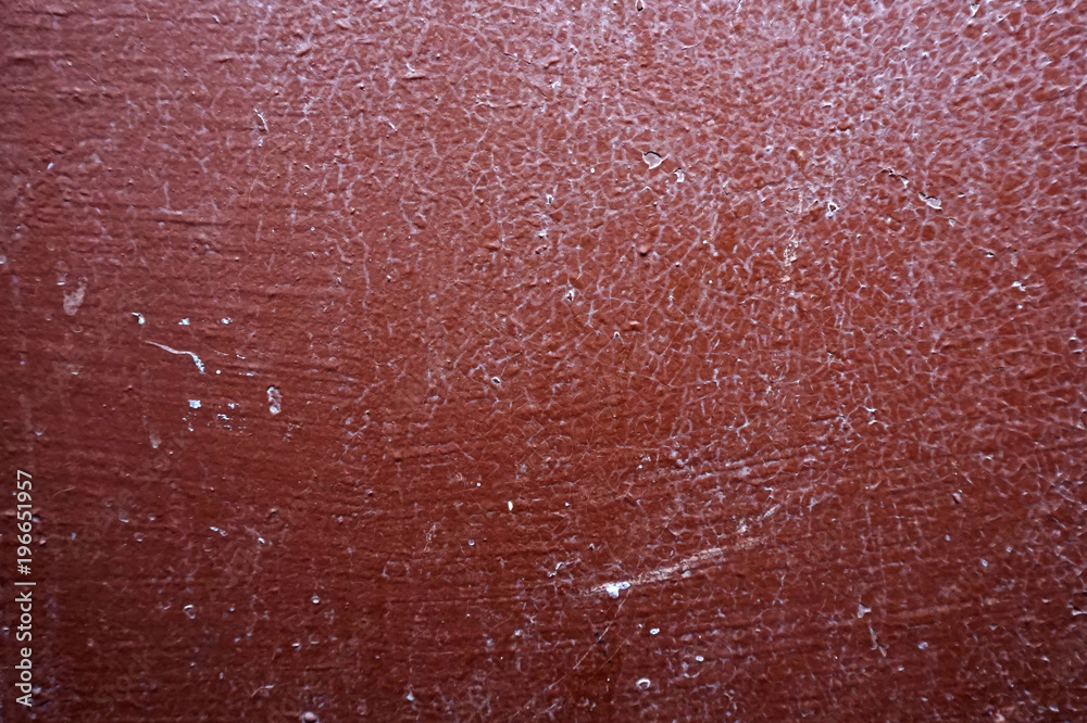 Fototapeta premium texture of an old brown paint with fine cracks