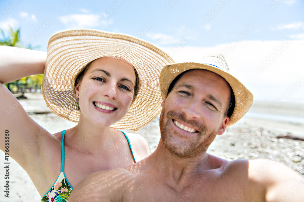 happy couple adult on seaside having fun togerher