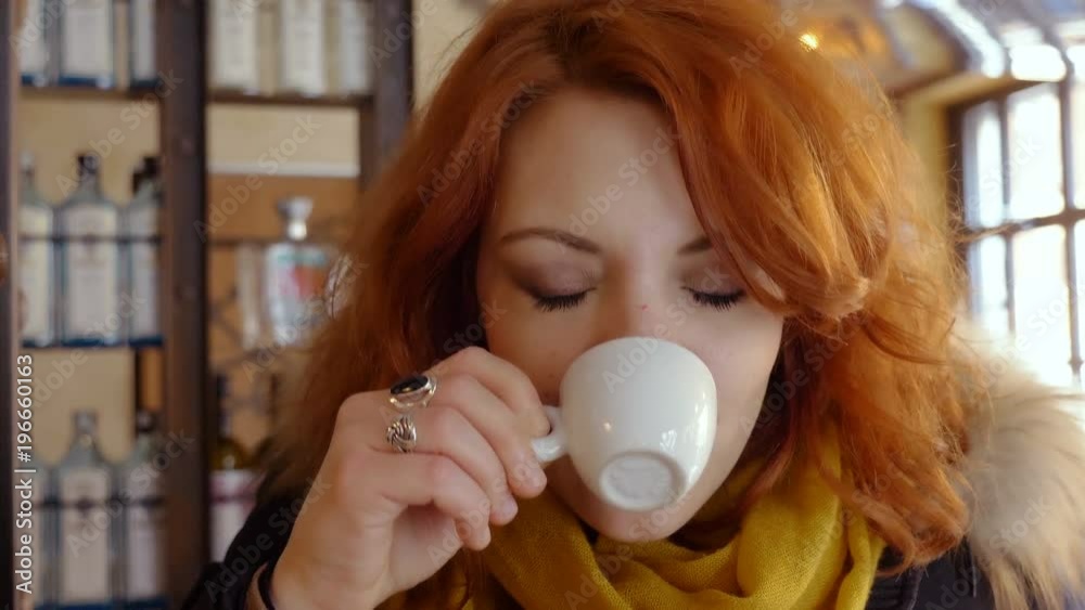 sexy young woman drinking an italian espresso- close up sexy young woman drinking an italian espresso- close up