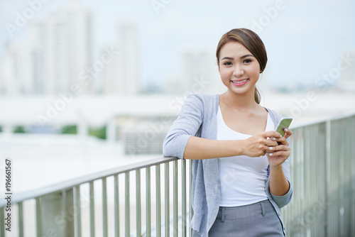Business lady with smartphone
