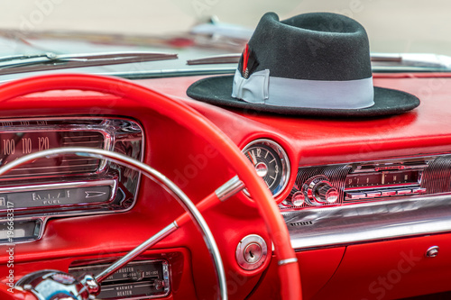 Vintage red dashboard with hat