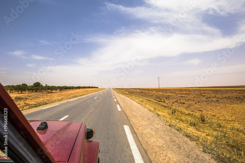 Algeria - June 08, 2017: 4x4 car on the road to the Sahara desert in Algeria photo