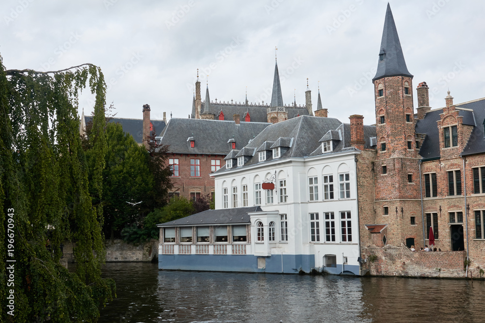 Medieval castle on the water in the tourist town of Bruges