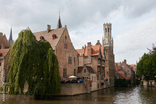 A large medieval house on the water in the tourist town of Bruges