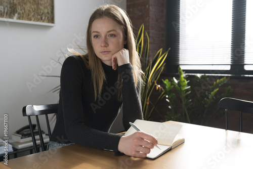 Thoughtful businesswoman working in office 