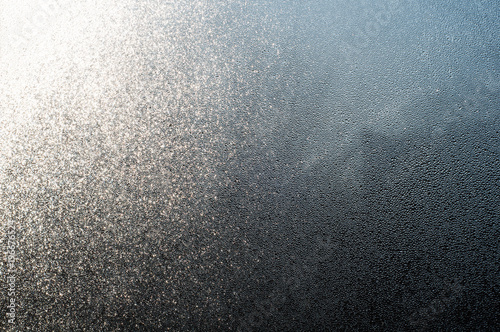 Small drops of water on the glass