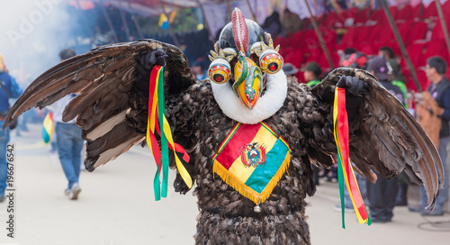 Vászonkép Oruro carnival in Bolivia with masked dancer during procession