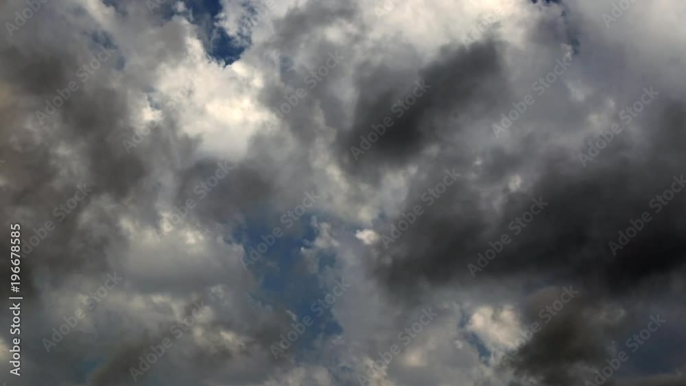 blue sky background with black clouds