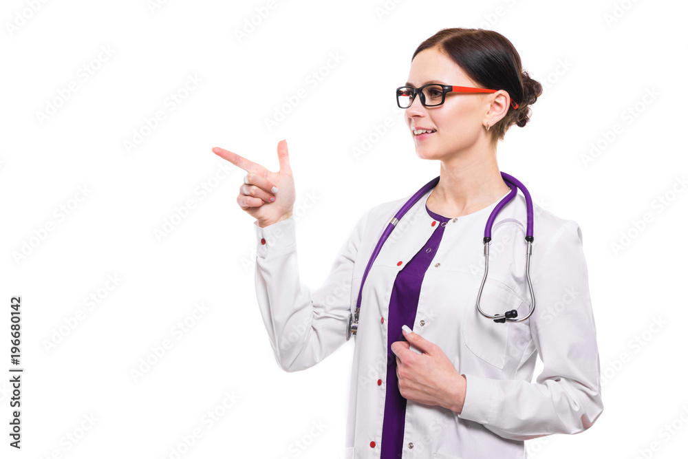 Young beautiful female doctor showing sign on white background Young beautiful female doctor showing sign on white background