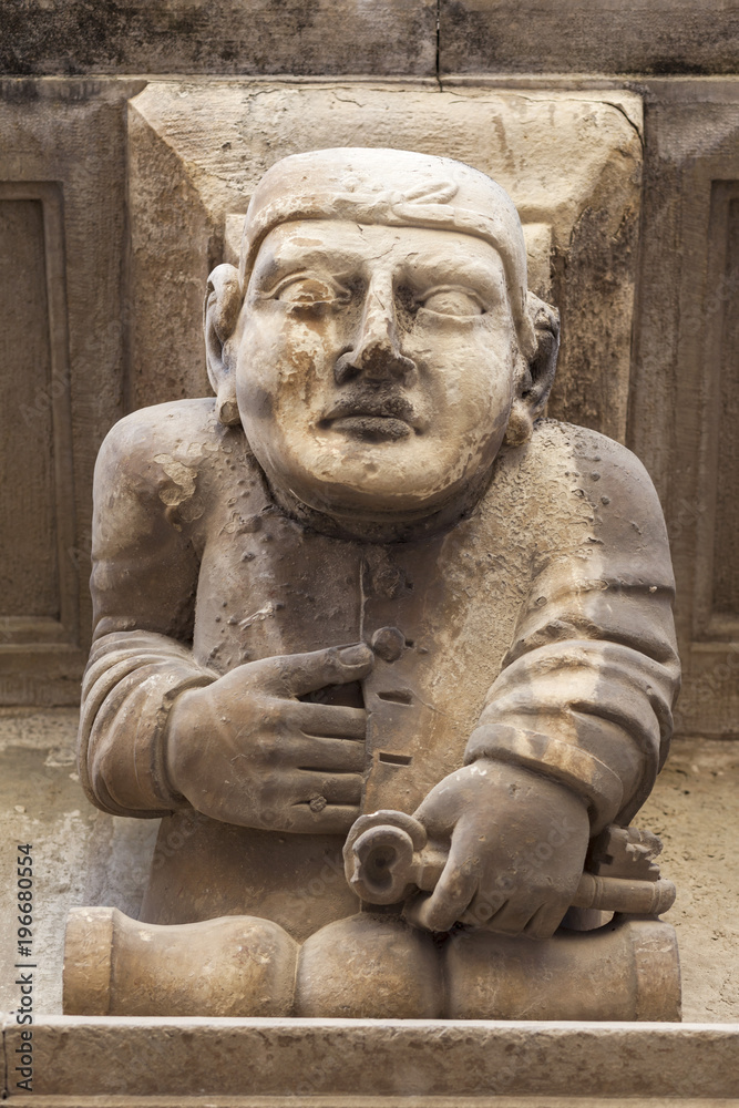Ancient corbel, located under balconies of city hall, represent different aspects of characters medieval era, Cervera, province Lleida, Catalonia.Spain.