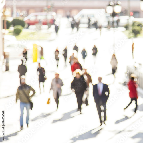 Urban background people moving- abstract blur
