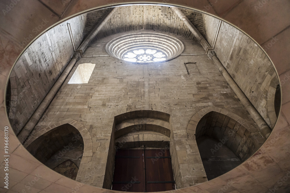  Old Cathedral, interior, wall reflection in big mirror,Catedral de Santa Maria de la Seu Vella, gothic style, iconic monument in the city of Lleida, Catalonia.Spain.