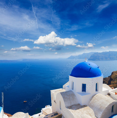 traditional blue dome with sea  Santorini