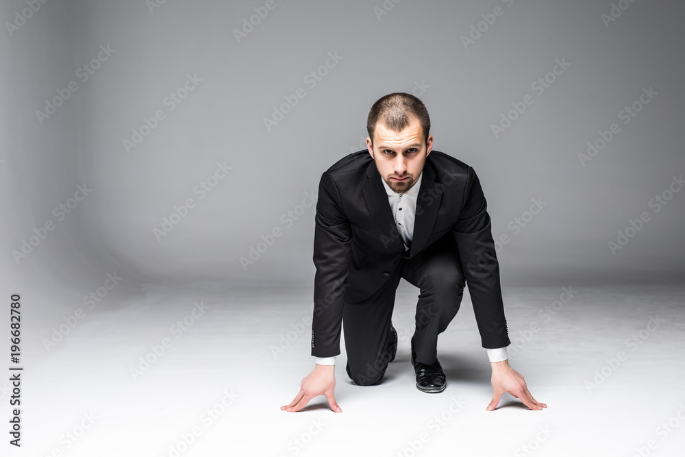 start your business. business man ready to start running over white background start your business. business man ready to start running over white background