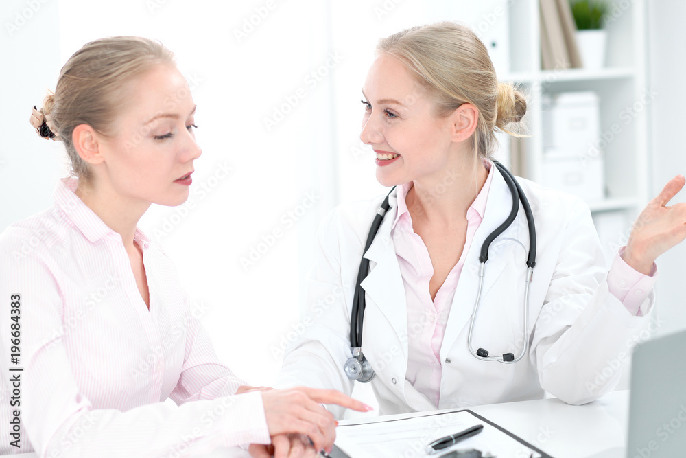 Doctor and patient during personal consulting in hospital Doctor and patient during personal consulting in hospital
