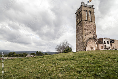 Tower and ruins of ancient castle in catalan village of Artes, province Barcelona,Catalonia,Spain.