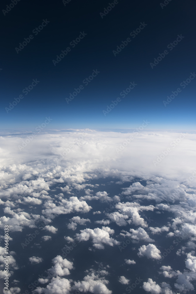 Beautiful view from window of airplane in blue sky Beautiful view from window of airplane in blue sky