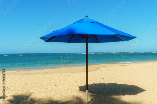 outdoor large blue sun umbrella on the beach