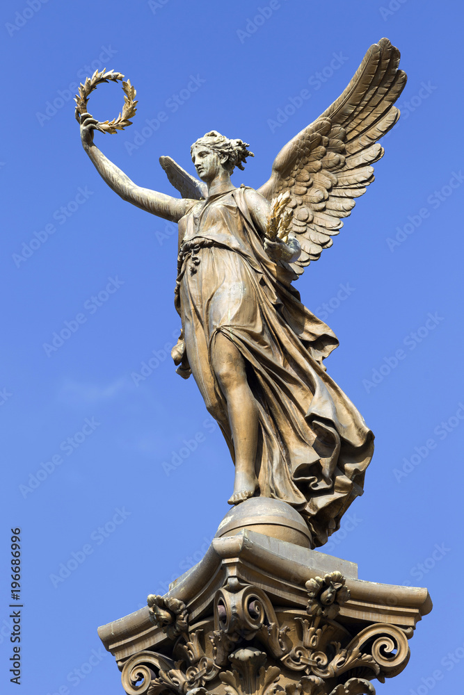 Obraz premium The gold Angel in front of House of Artists, Prague, Czech Republic